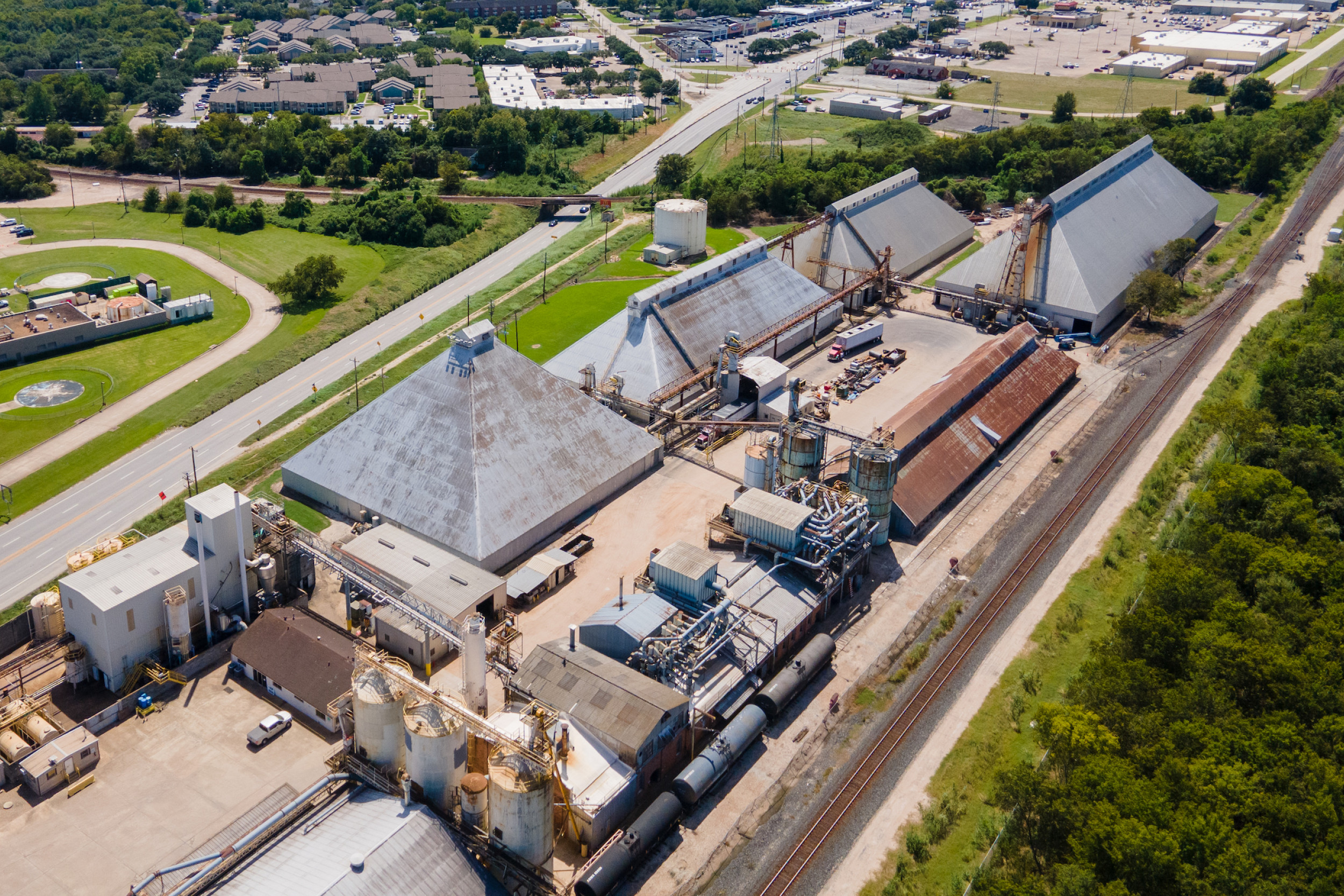 Aerial photo with industrial site in the foreground and Richmond in the background