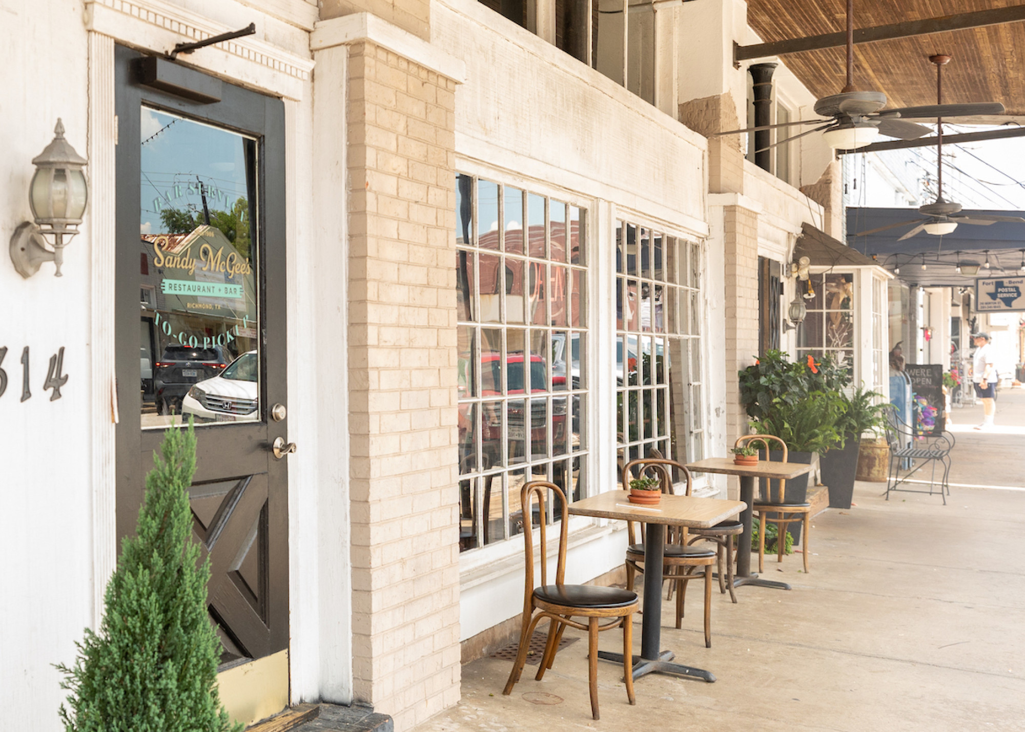 Storefront and sidewalk area of Sandy McGee's Restaurant