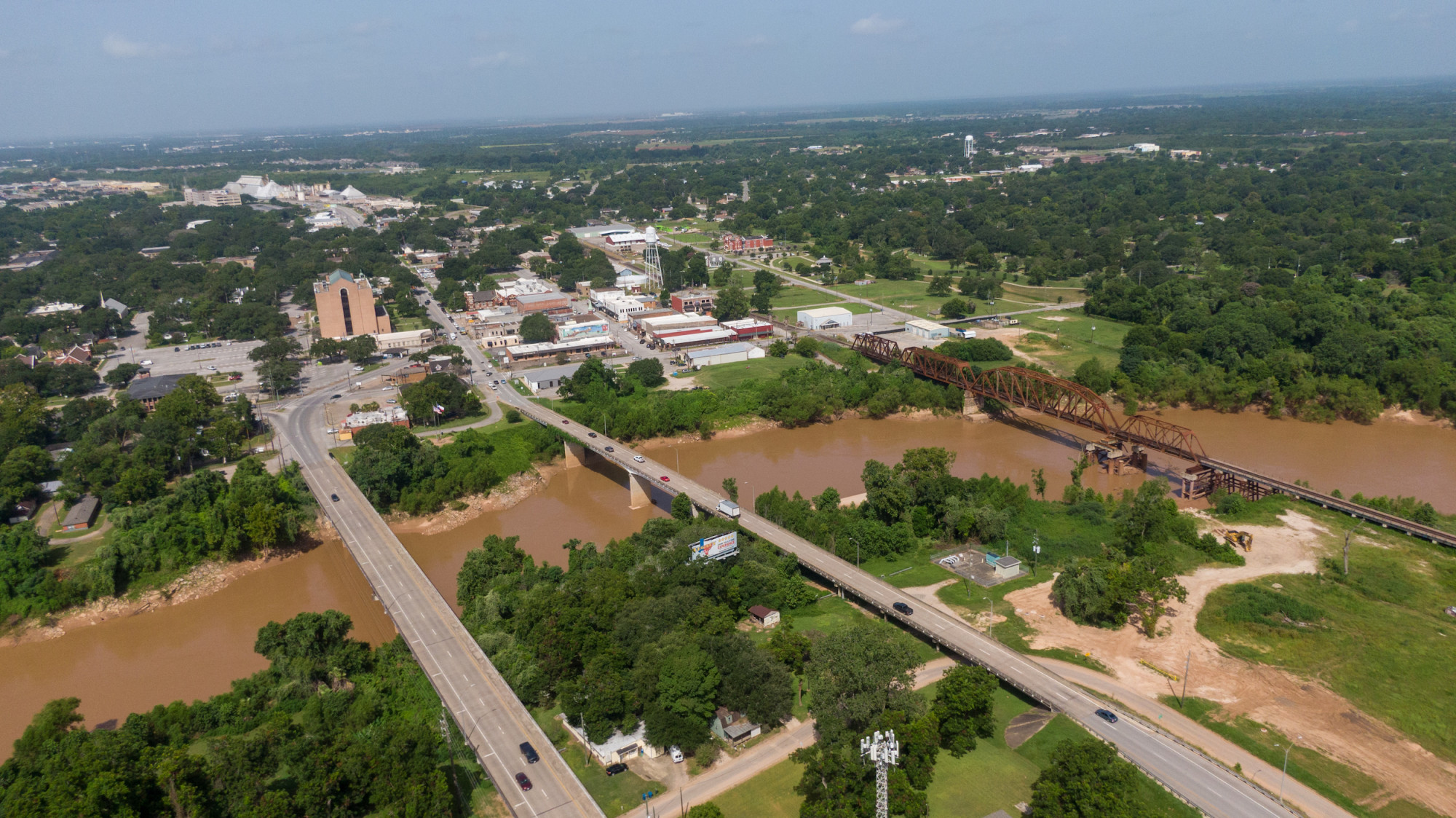 aerial view of the brazos river with richmond in the background