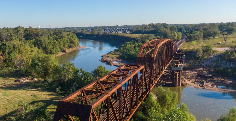 Aerial view of the richmond train bridge over the brazos river